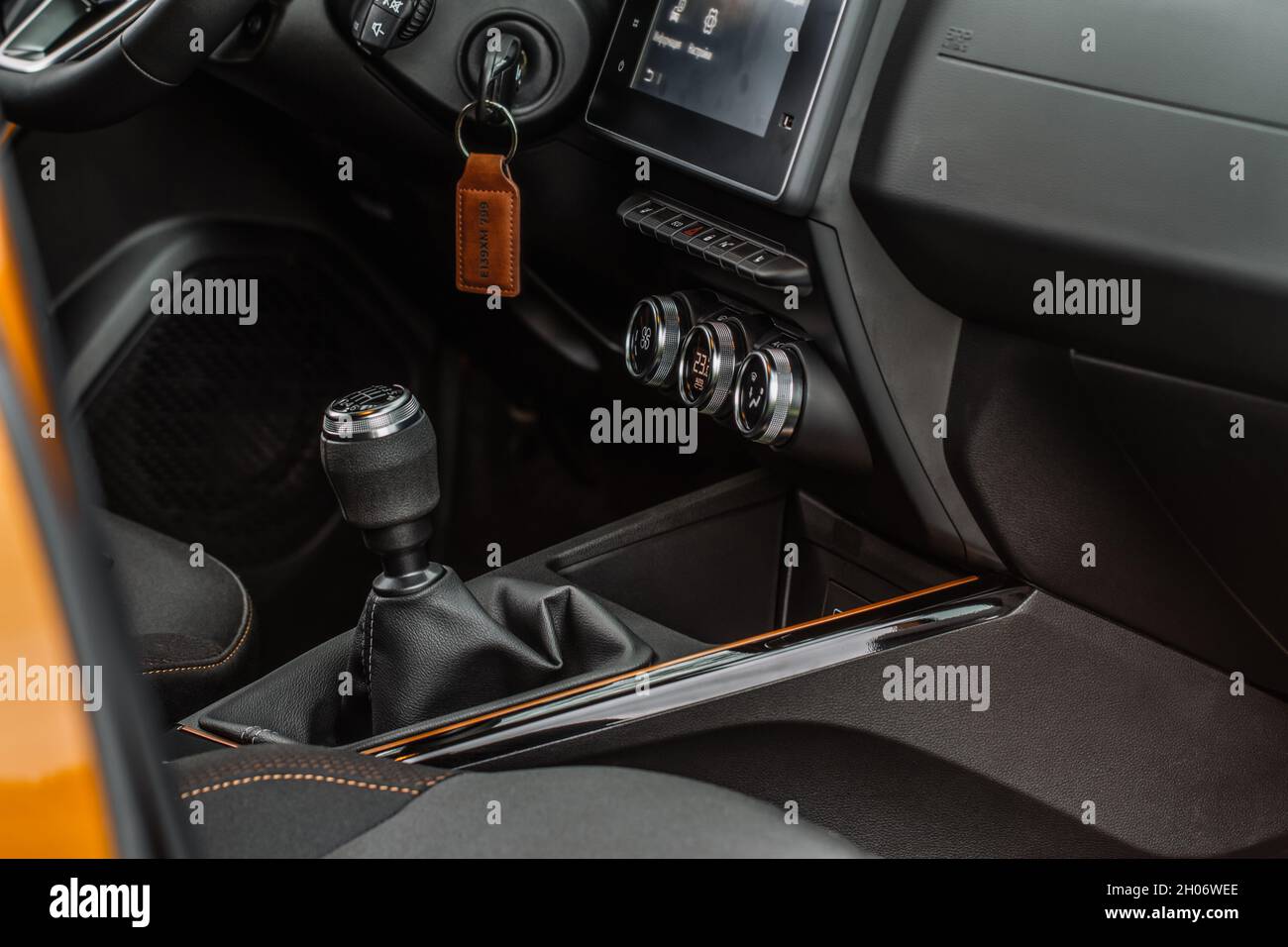 Manual transmission shift selector in the car interior. Gear shift handle in a modern car. Gear box transmission stick shift lever. Stock Photo