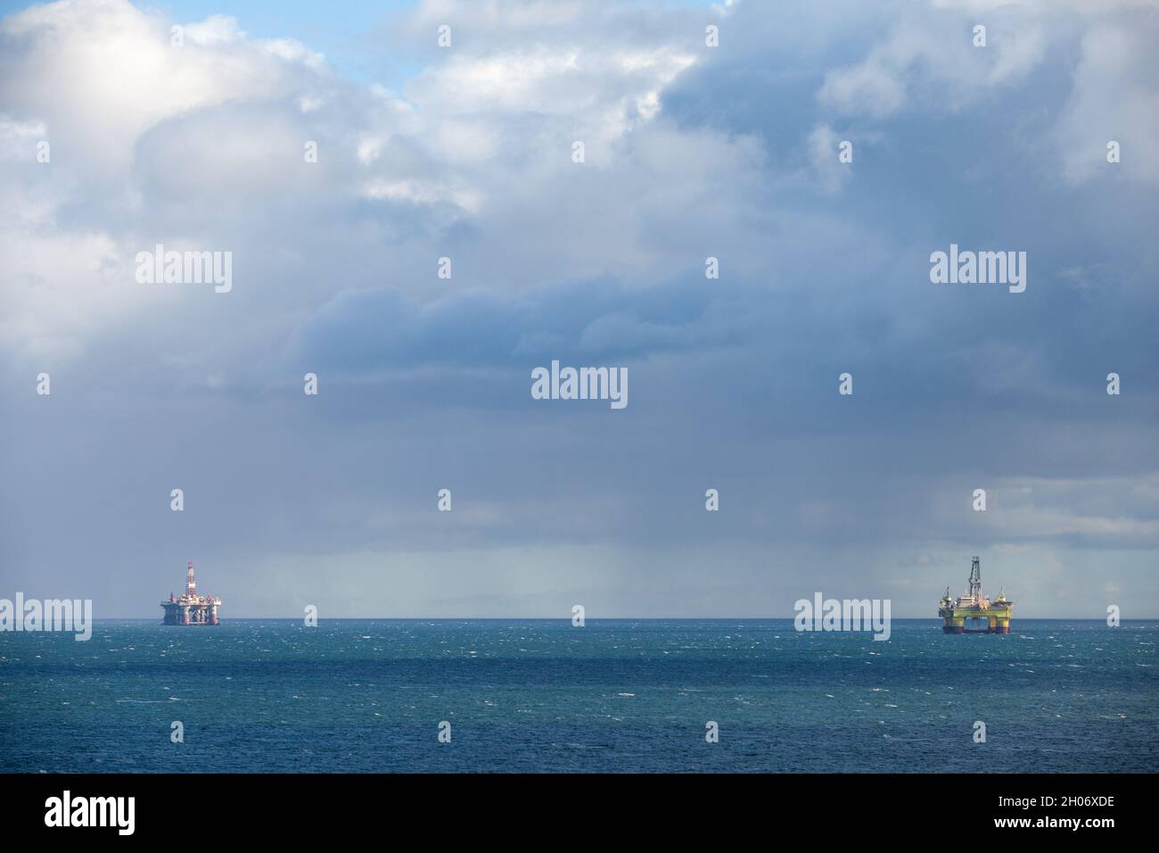 Oil rigs in the Firth of Forth seen from Fife Stock Photo