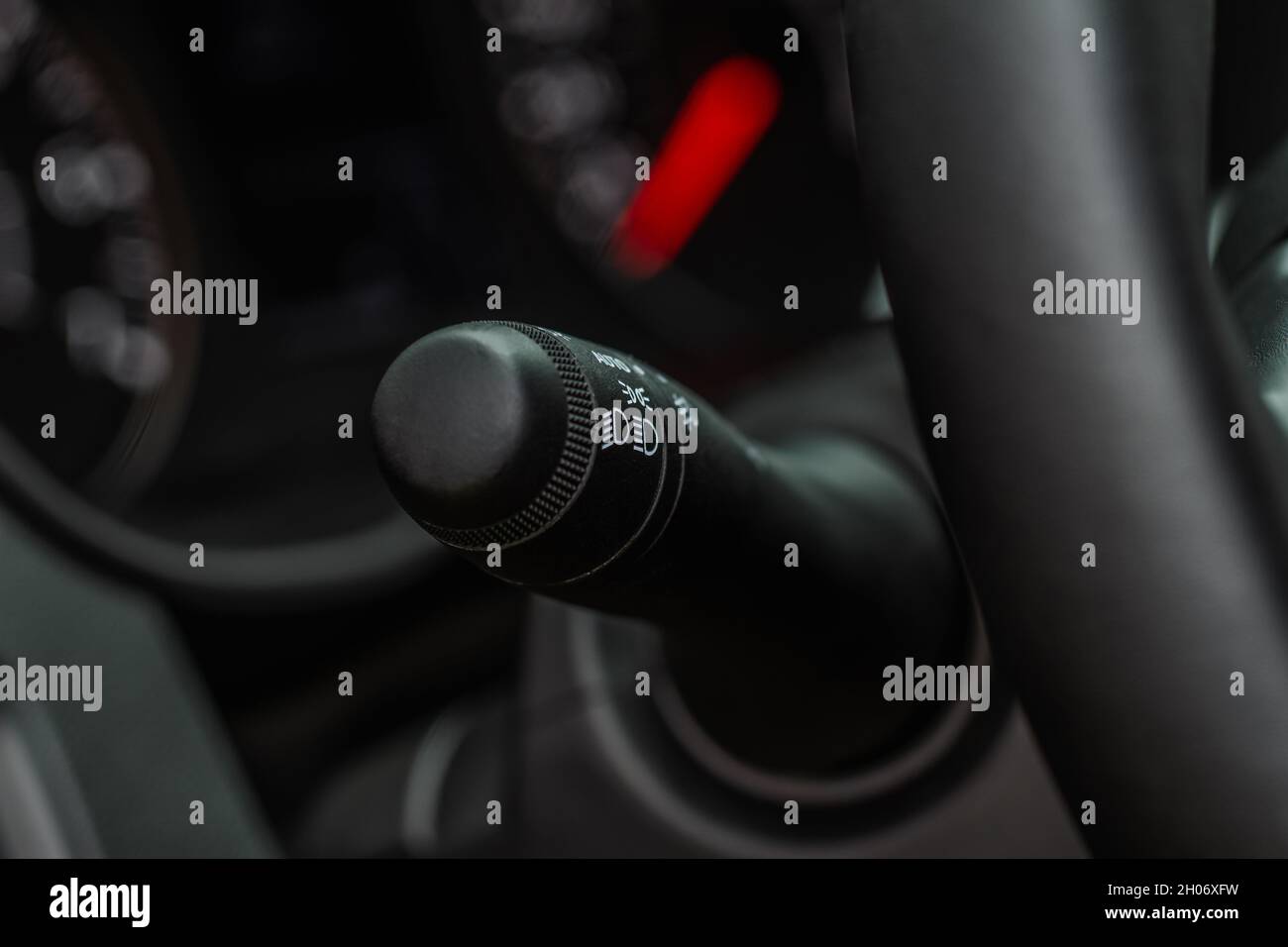 Car lighting switch. Light knob in the car. Headlight control stick