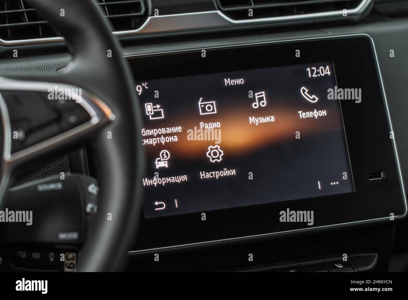 Modern car dashboard with navigation system and usb port. Car interior