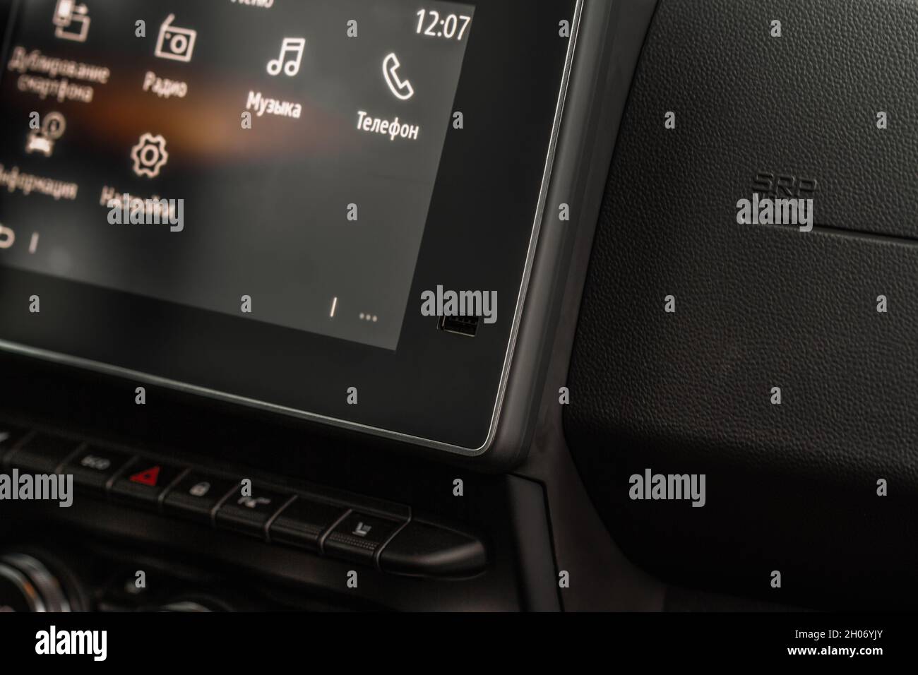 Modern car dashboard with navigation system and usb port. Car interior