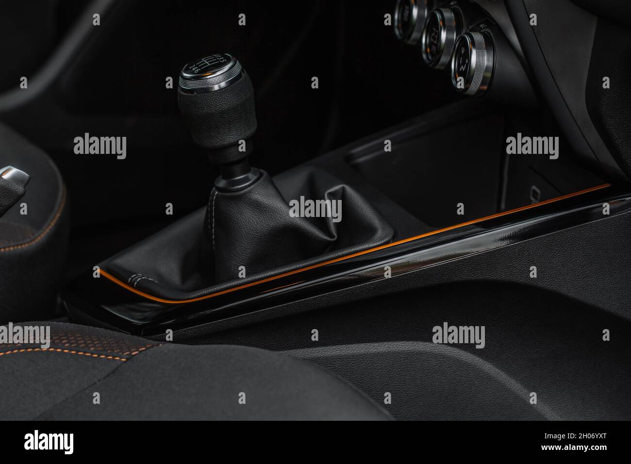 Manual transmission shift selector in the car interior. Gear shift handle in a modern car. Gear box transmission stick shift lever. Stock Photo