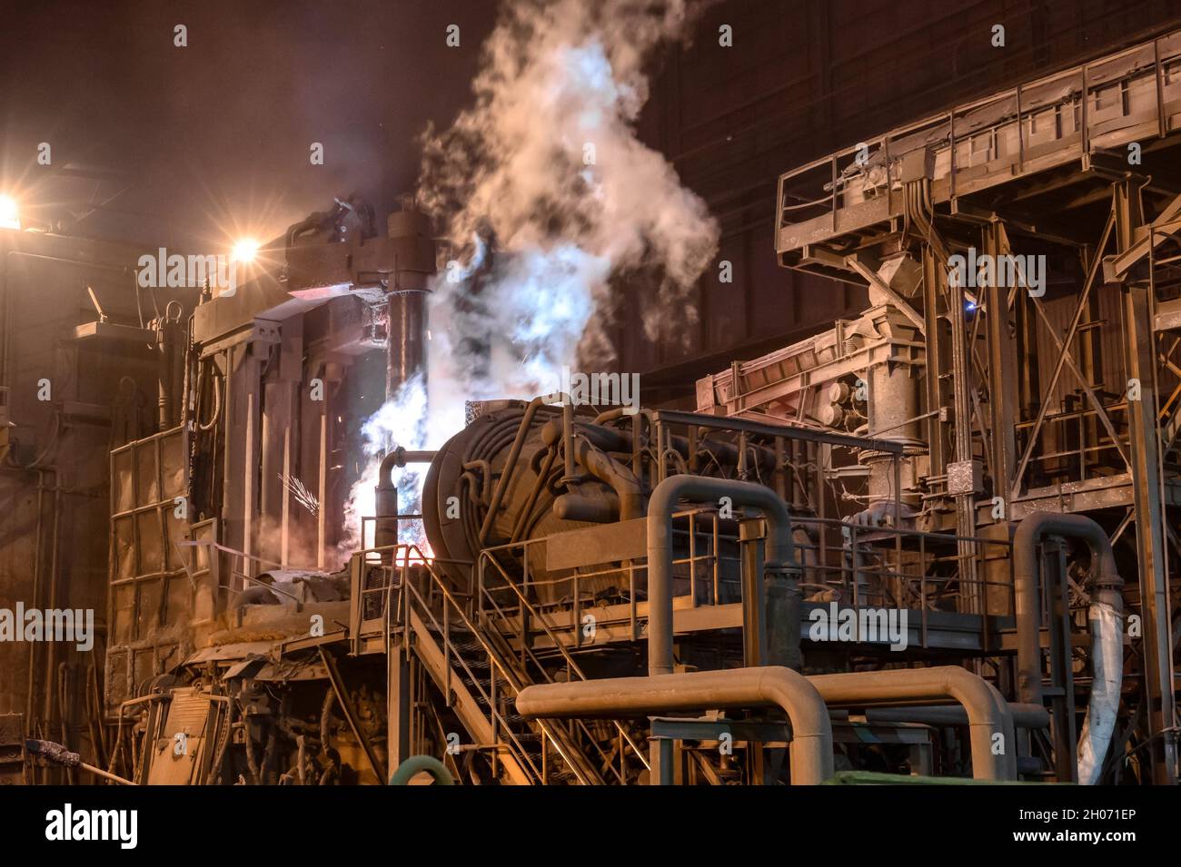 Electric steel furnace, glowing graphite electrodes Stock Photo Alamy