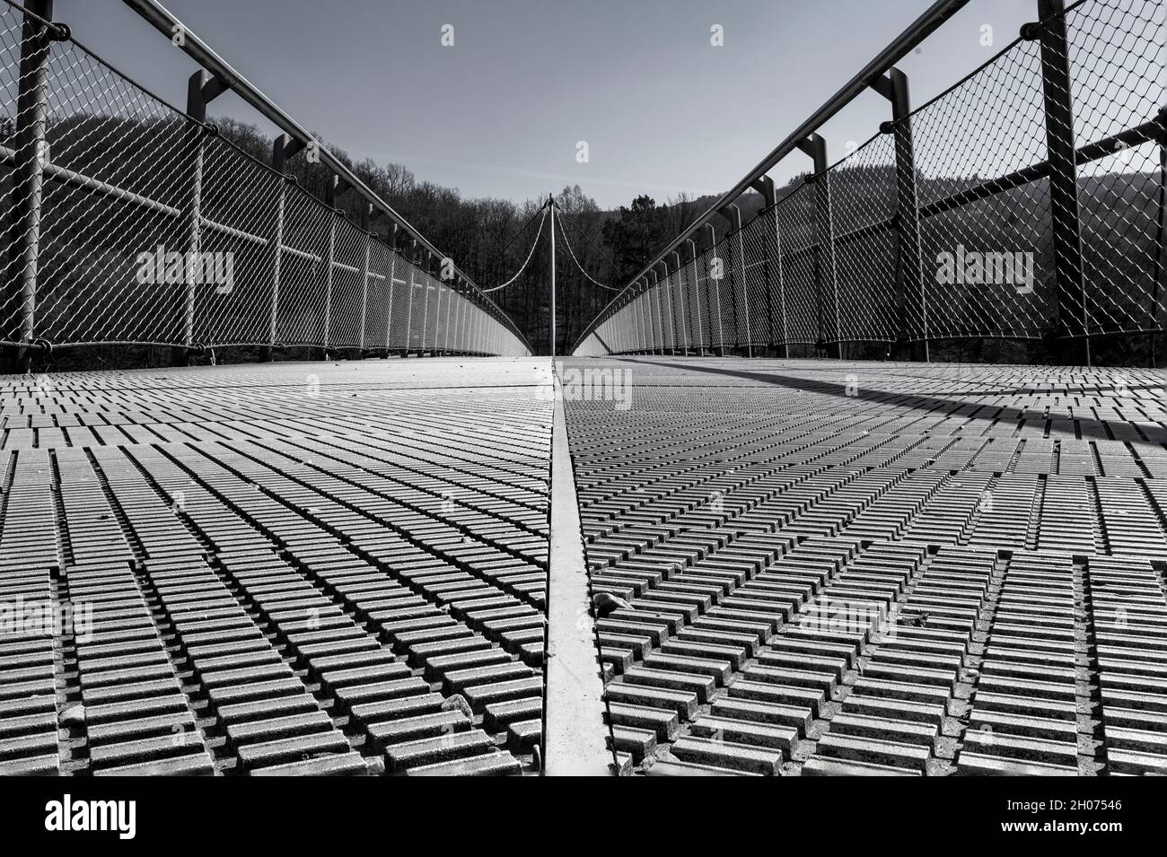 view on destination - metal bridge focussed in diminishing perspective Stock Photo