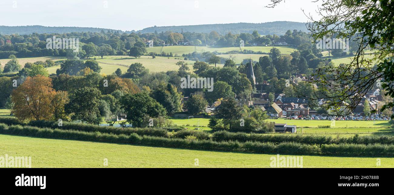 View over Shere village in the Surrey Hills Area of Outstanding Natural Beauty, England, UK, on a sunny October or autumn day Stock Photo