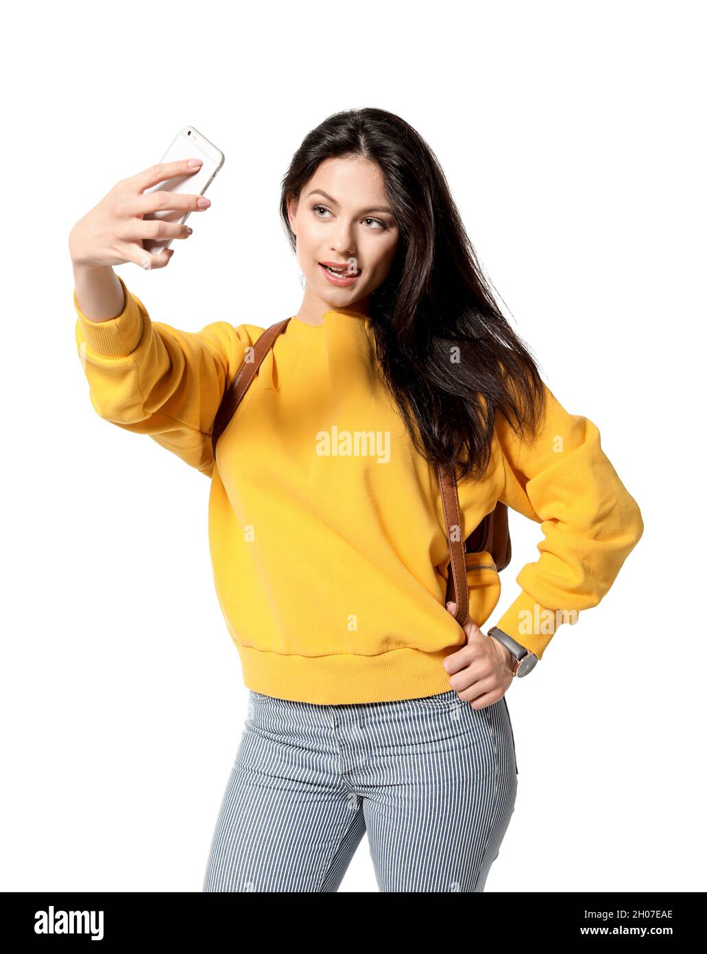 Attractive young woman taking selfie on white background Stock Photo ...