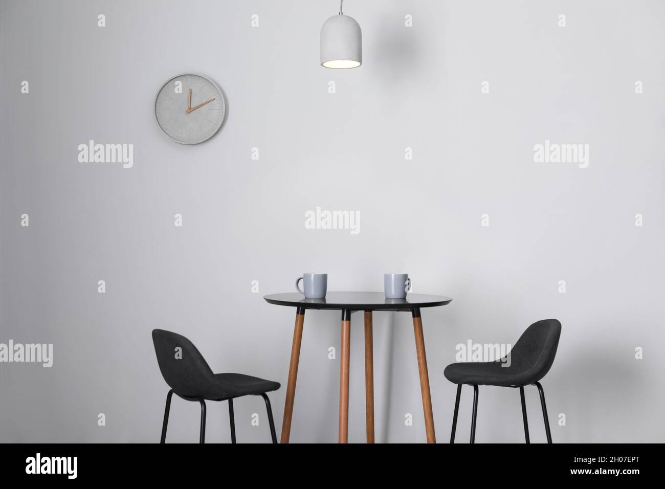 Stylish room interior with wall clock. Time of day Stock Photo Alamy