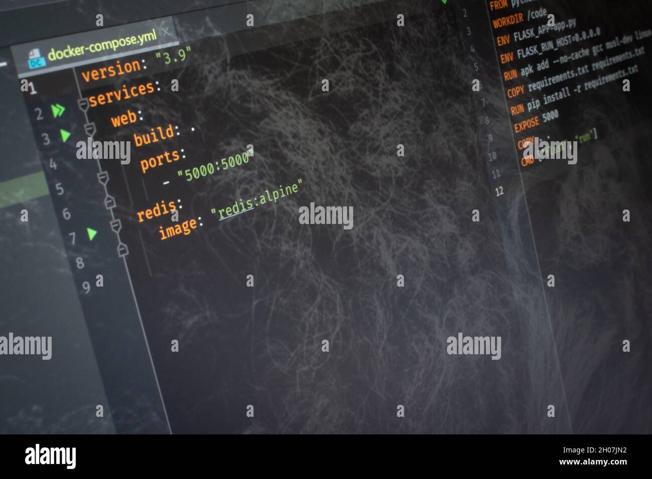 Docker compose Hello World code on screen Stock Photo