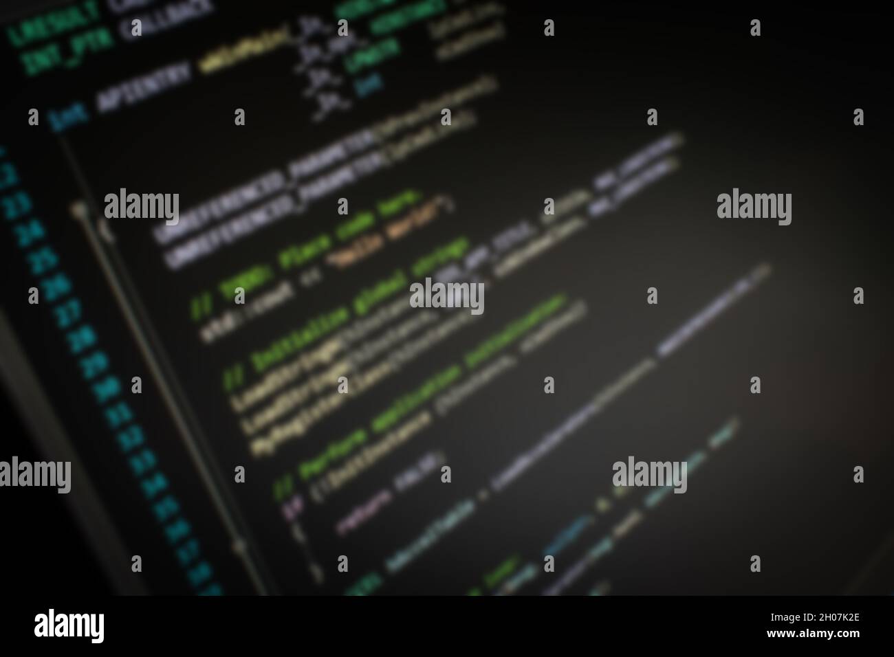 C++ Hello World code on screen blurry background image Stock Photo