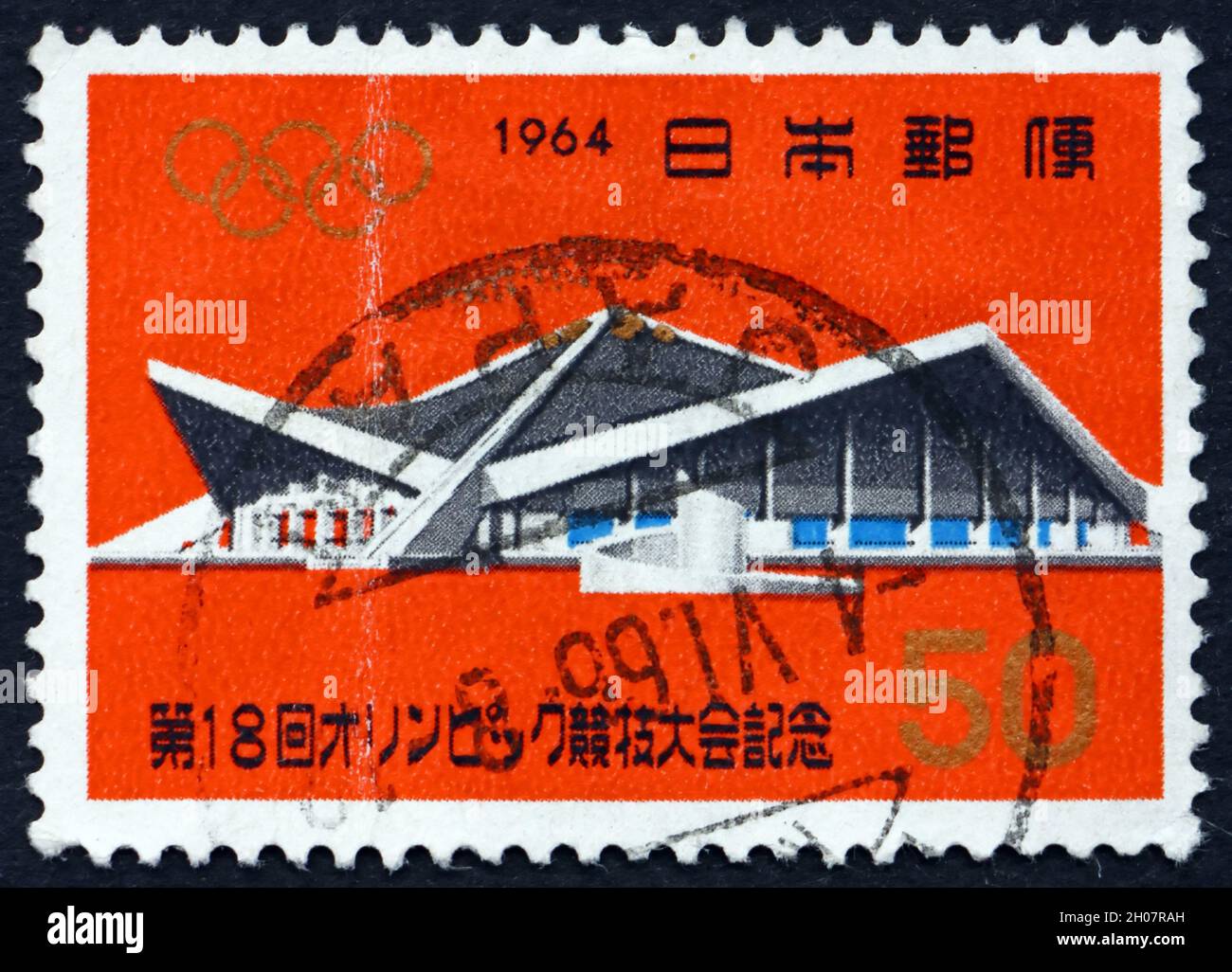 JAPAN - CIRCA 1964: a stamp printed in the Japan shows Komazawa Gymnasium, 18th Olympic Games, Tokyo, circa 1964 Stock Photo