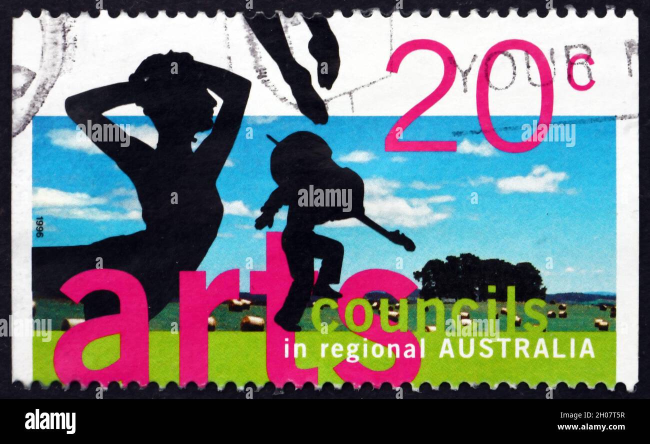 AUSTRALIA - CIRCA 1996: a stamp printed in Australia shows Silhouettes of Ballet Dancer and Violinist, Arts Councils in Regional Australia, circa 1996 Stock Photo