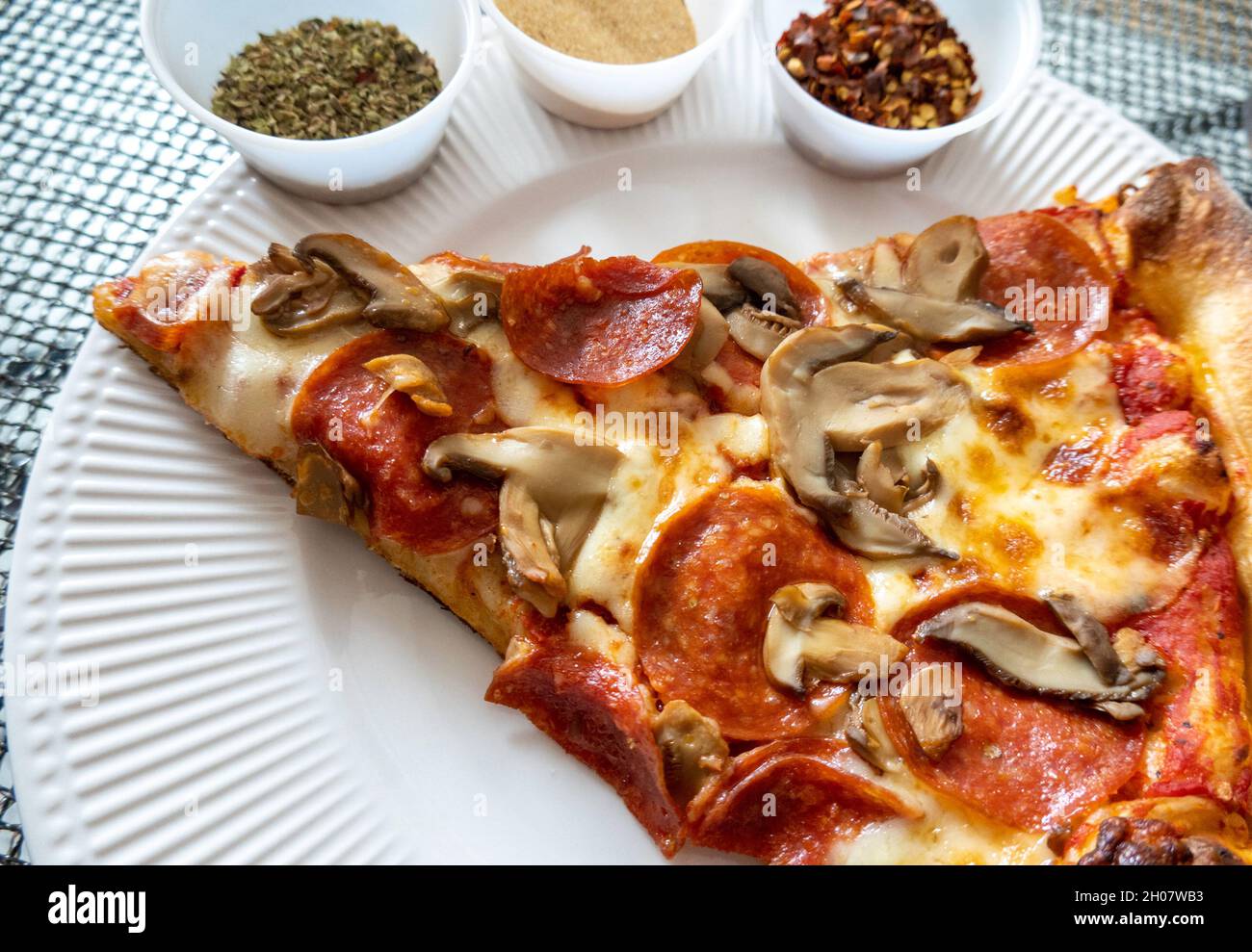 Close up of Pepperoni and mushroom pizza slice, USA Stock Photo Alamy