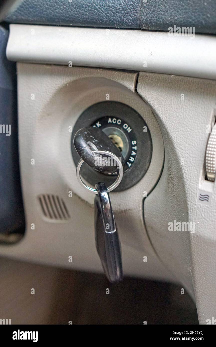 Key in car ignition start acc on Stock Photo Alamy
