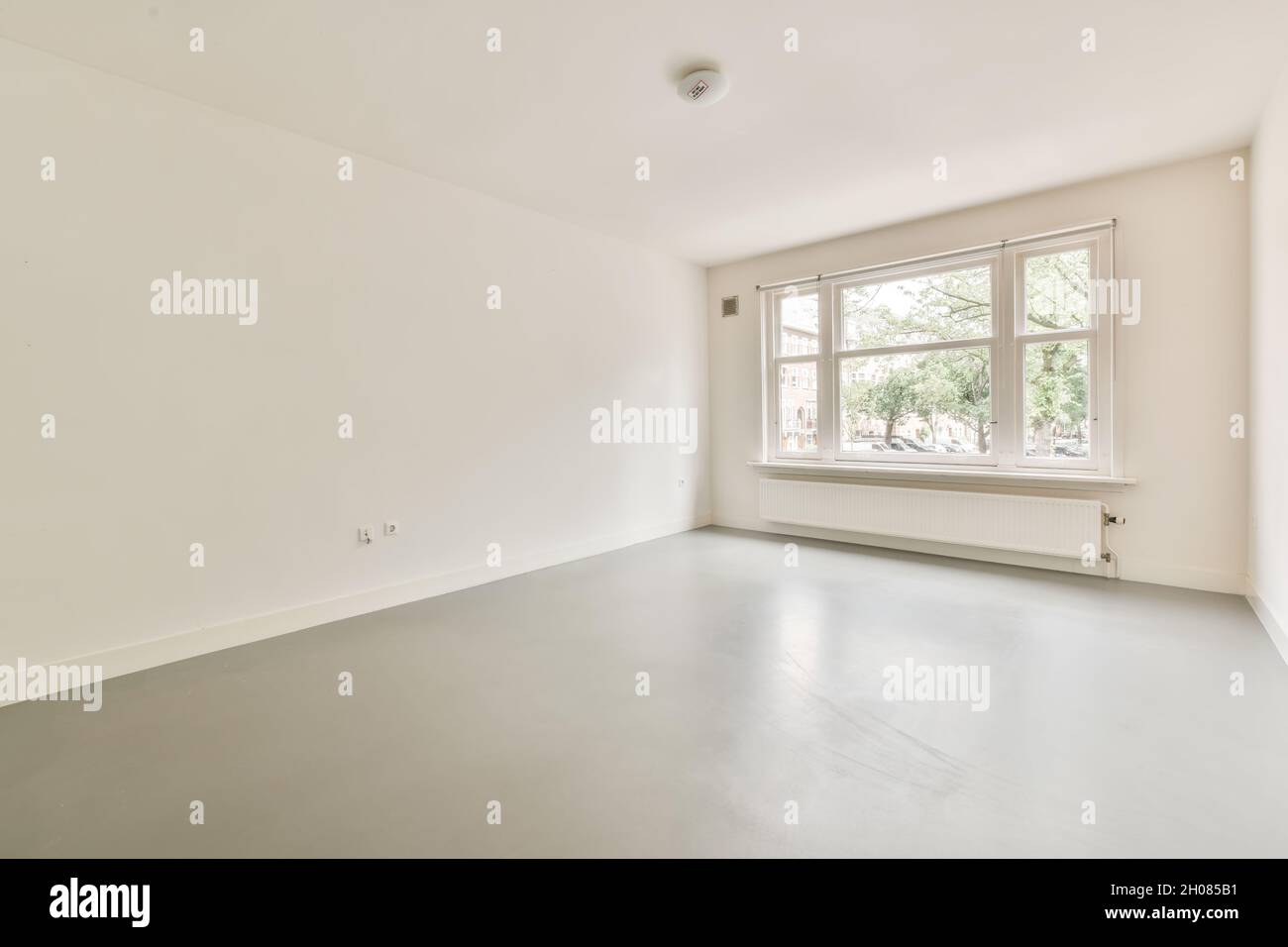 Beautiful renovated empty white room interior with windows Stock Photo ...