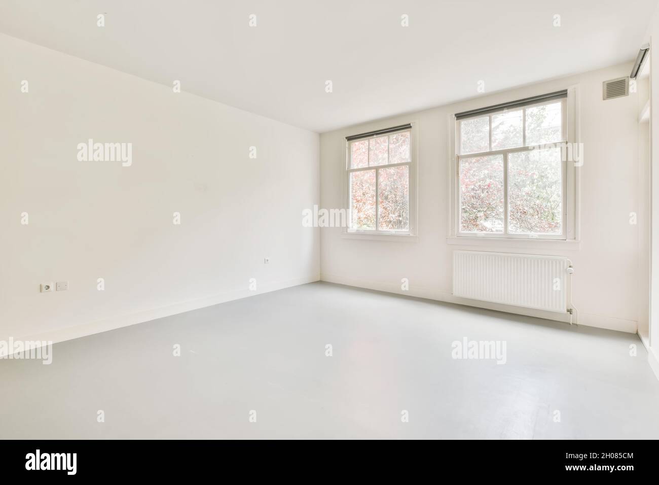 Beautiful renovated empty white room interior with windows Stock Photo ...