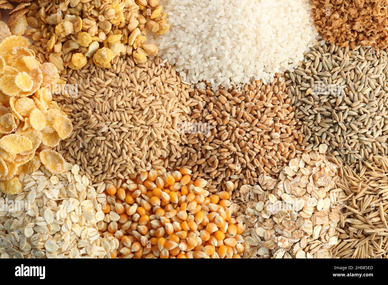 Different types of grains and cereals as background Stock Photo Alamy