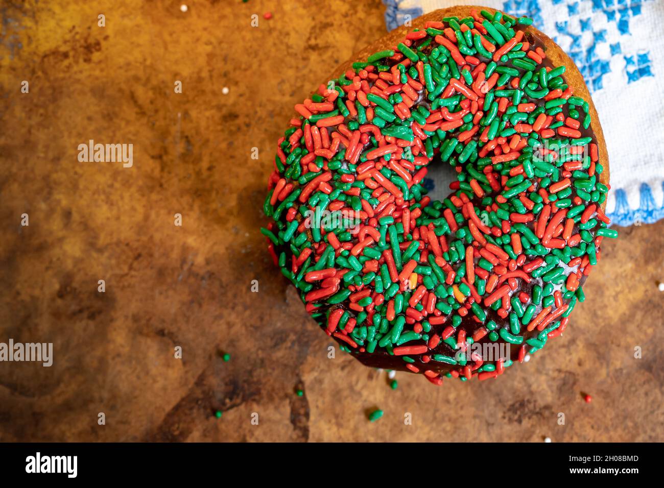 Doughnut with Sprinkles Top Down or Lay Flat View Stock Photo
