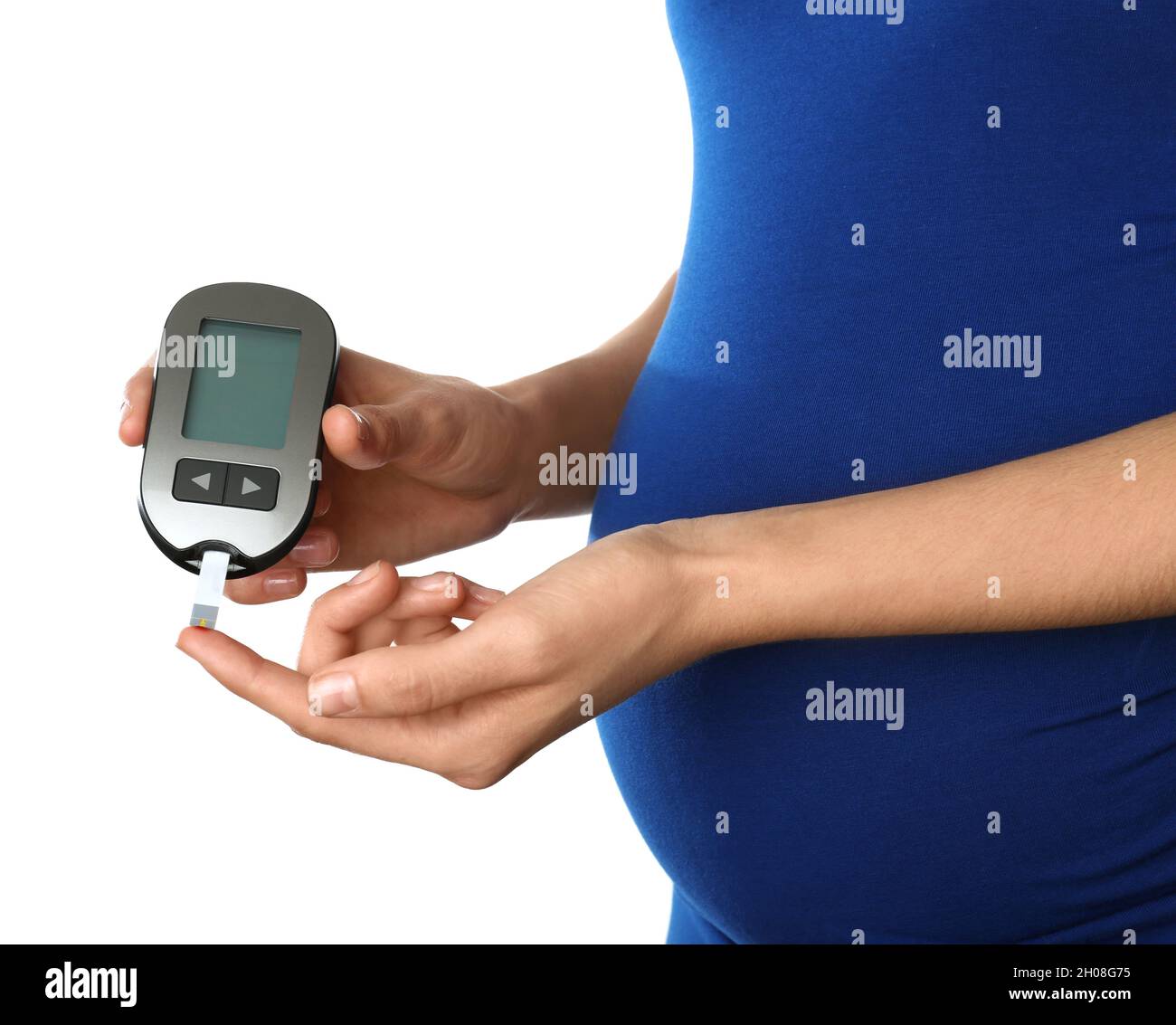 Pregnant woman checking blood sugar level with on white