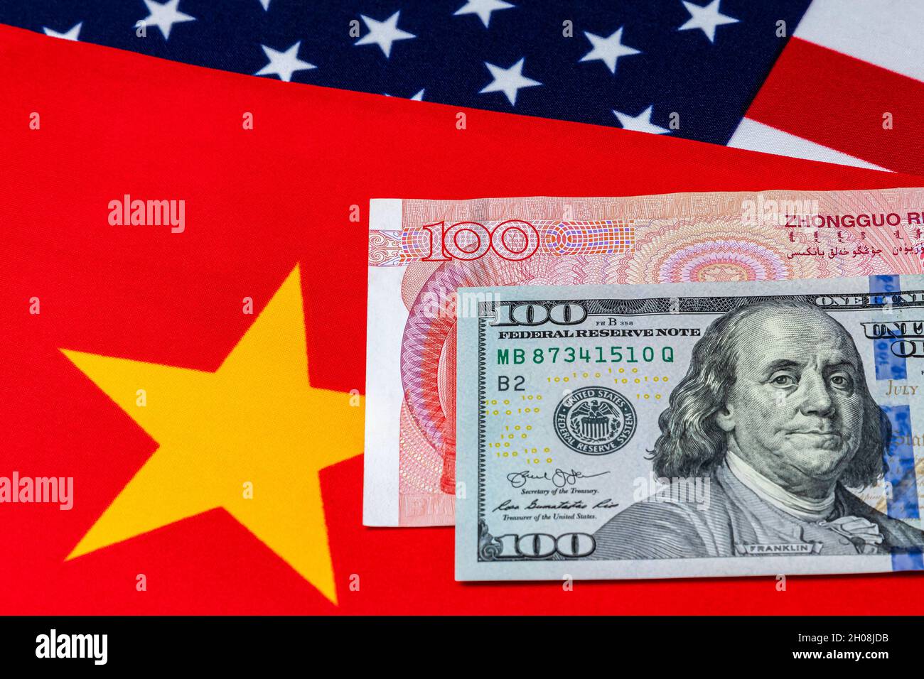 China and United States of America money and flags. Concept of Chinese and American trade war, economy and financial market Stock Photo