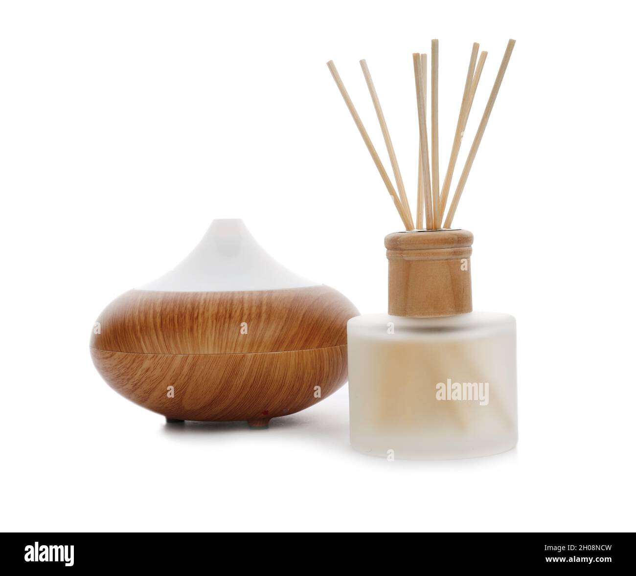 Aromatic reed freshener and oil diffuser on white background Stock