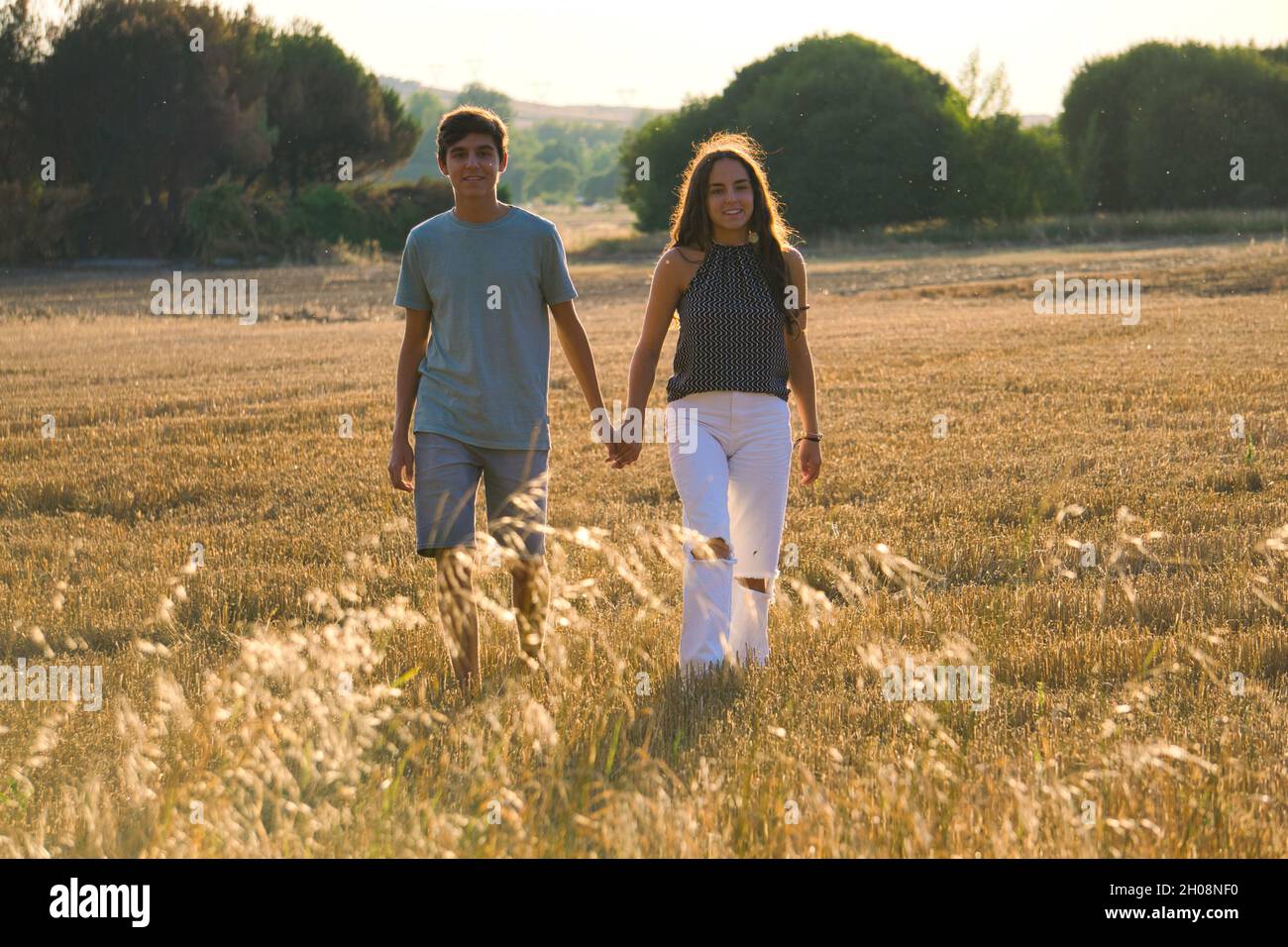 Hispanic couple holding hands hi-res stock photography and images - Alamy