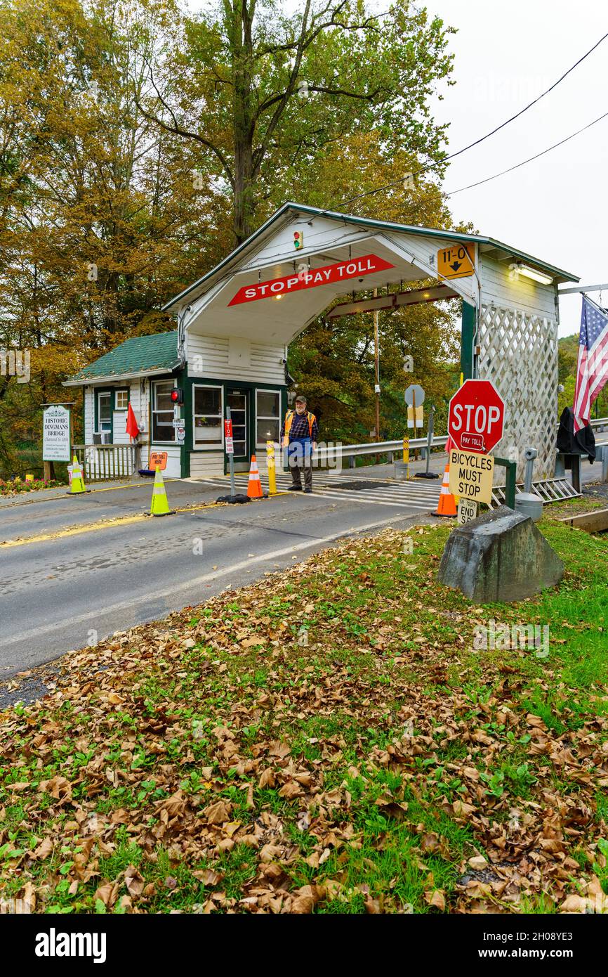 Dingmans Ferry, PA, USA October 10, 2021 A toll collector waits for