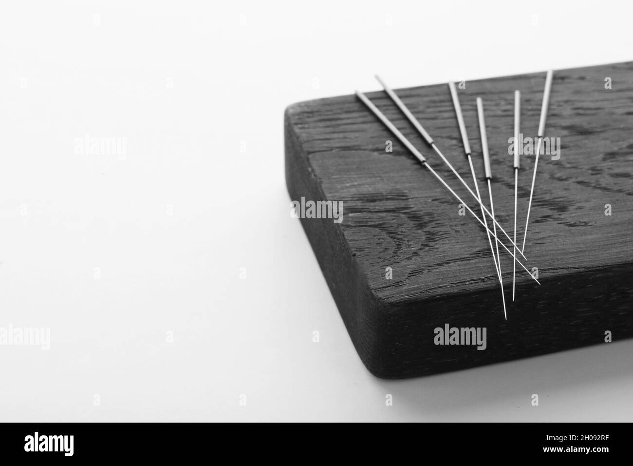 Board with needles for acupuncture on white background Stock Photo Alamy