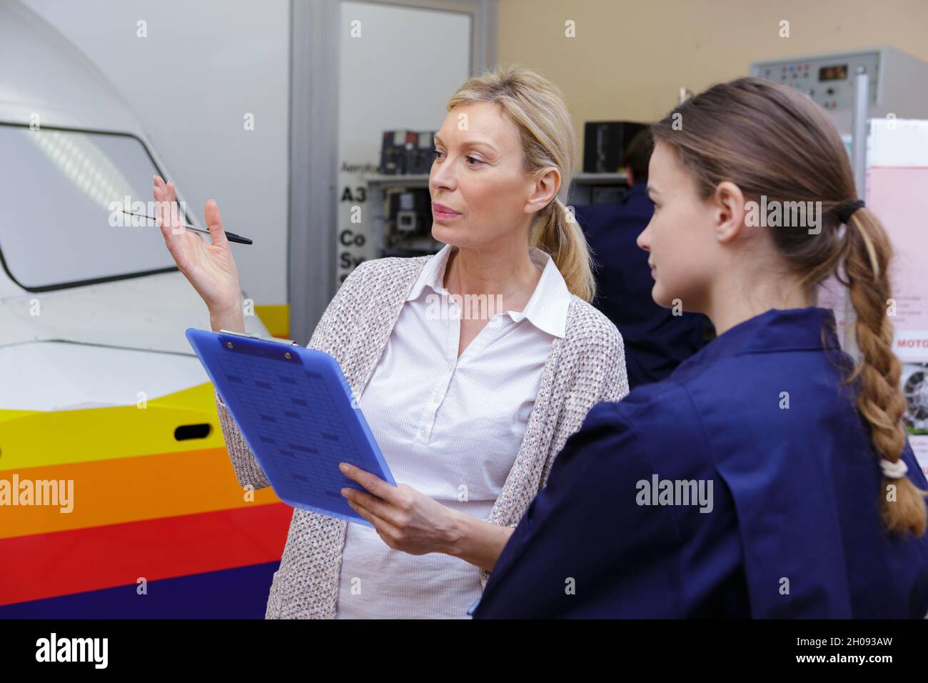African american pilot checking hi-res stock photography and images - Alamy