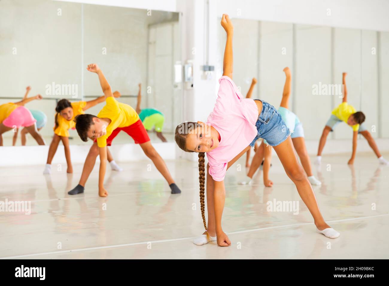 Group of kids training dance moves Stock Photo Alamy