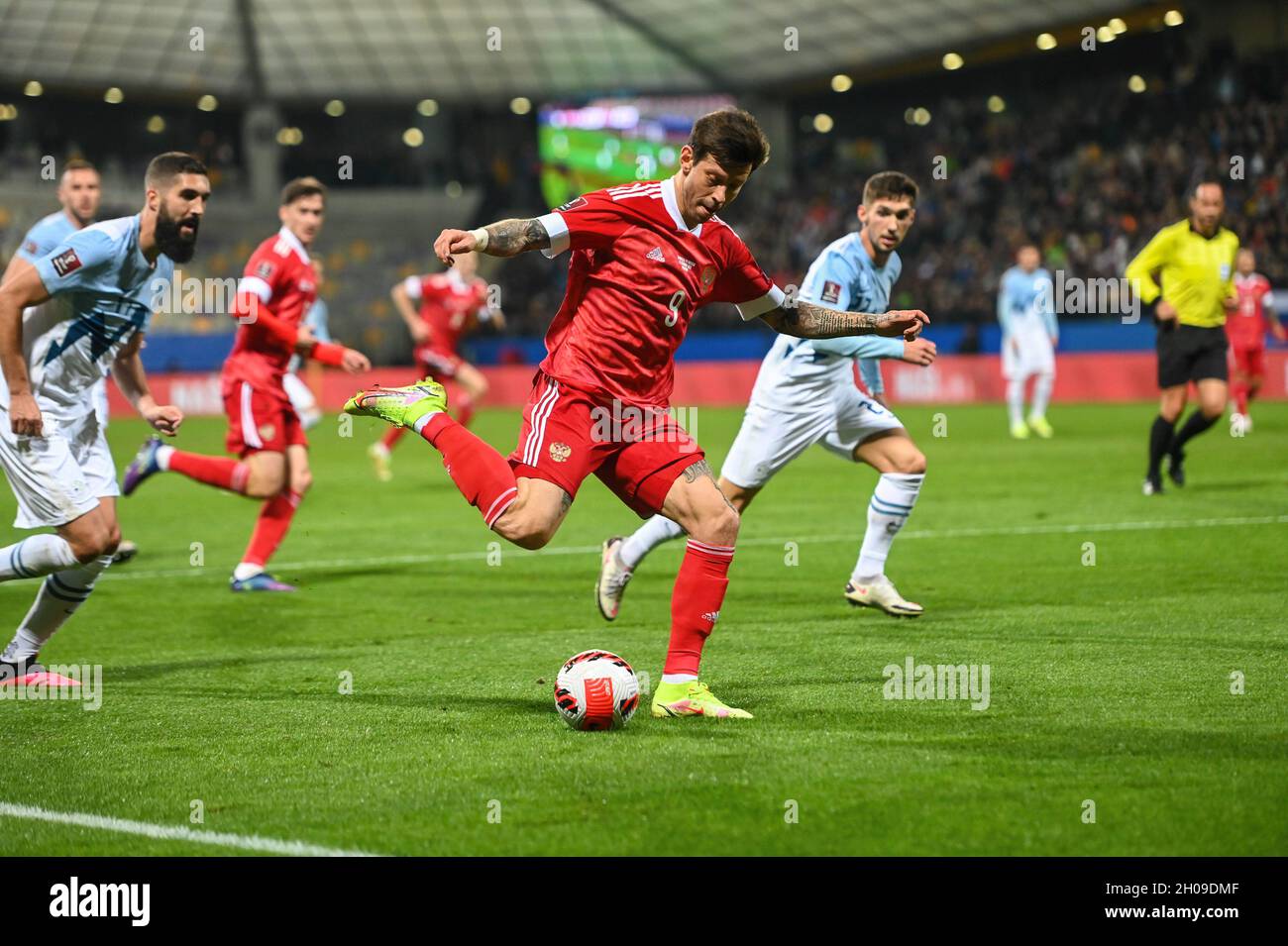 Maribor, Slovenia. 11th Oct, 2021. Fedor Smolov (center) of Russia seen in action during the 2022 FIFA World Cup Group H Qualifier match between Slovenia and Russia.(Final score; Slovenia 1:2 Russia) Credit: SOPA Images Limited/Alamy Live News Stock Photo