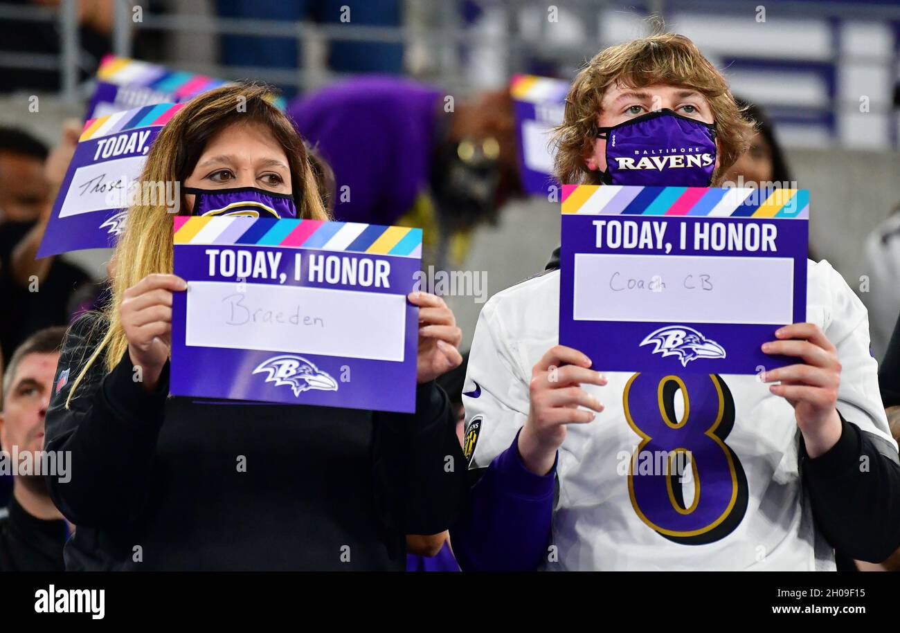 Baltimore, United States. 12th Oct, 2021. Baltimore Ravens fans honor cancer victims during the first half of a game against the Indianapolis Colts at M&T Bank Stadium in Baltimore, Maryland, on Monday, October 11, 2021. Photo by David Tulis/UPI Credit: UPI/Alamy Live News Stock Photo