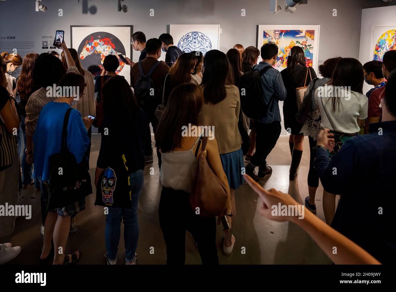 Visitors scan and use augmented reality (AR) with their smartphones as a  way to interact with different artworks at the Digital Art Fair Asia in  Hong Kong, China, on October 08, 2021.