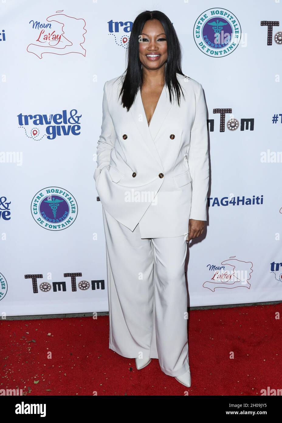 West Hollywood, United States. 11th Oct, 2021. WEST HOLLYWOOD, LOS ANGELES, CALIFORNIA, USA - OCTOBER 11: Actress Garcelle Beauvais arrives at Travel and GIVE's 4th Annual 'Travel With A Purpose' Fundraiser With Lisa Vanderpump (Fundraiser to Benefit Teletherapy Program and Communities in Haiti Affected by Earthquake) held at TOM TOM Restaurant and Bar on October 11, 2021 in West Hollywood, Los Angeles, California, United States. (Photo by Xavier Collin/Image Press Agency/Sipa USA) Credit: Sipa USA/Alamy Live News Stock Photo