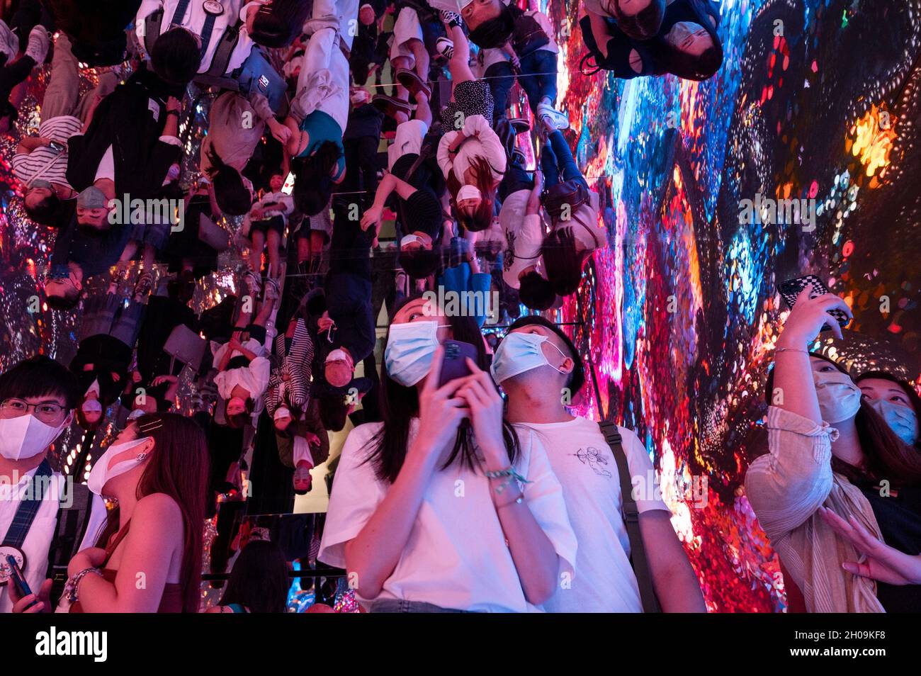 People visit and take photos of the immersive art installation titled  