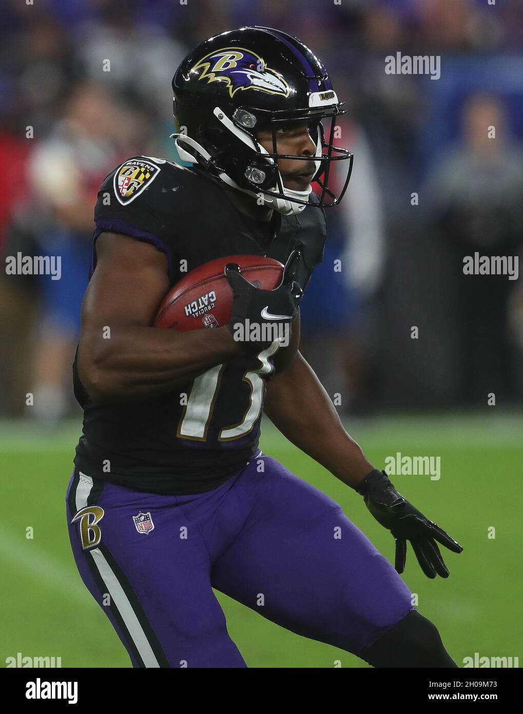 Washington Commanders WR Dyami Brown (2) catches a pass while being  defended by Baltimore Ravens DB Brandon Stephens (21) during a preseason  game at M&T Bank Stadium in Baltimore, Maryland on August