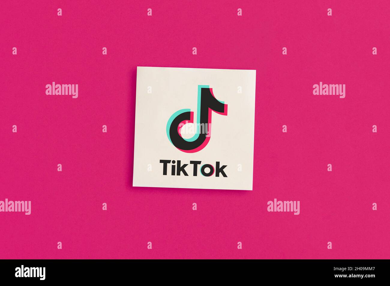 MOSCOW, RUSSIA - 12 OCT 2021: Tik Tok logo on a pink background Stock Photo