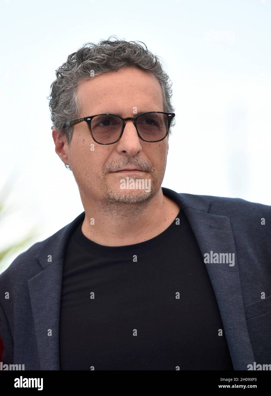 74th edition of the Cannes Film Festival: Kleber Mendoca Filho posing during a photocall with the official jury members of the Cannes Film Festival, o Stock Photo