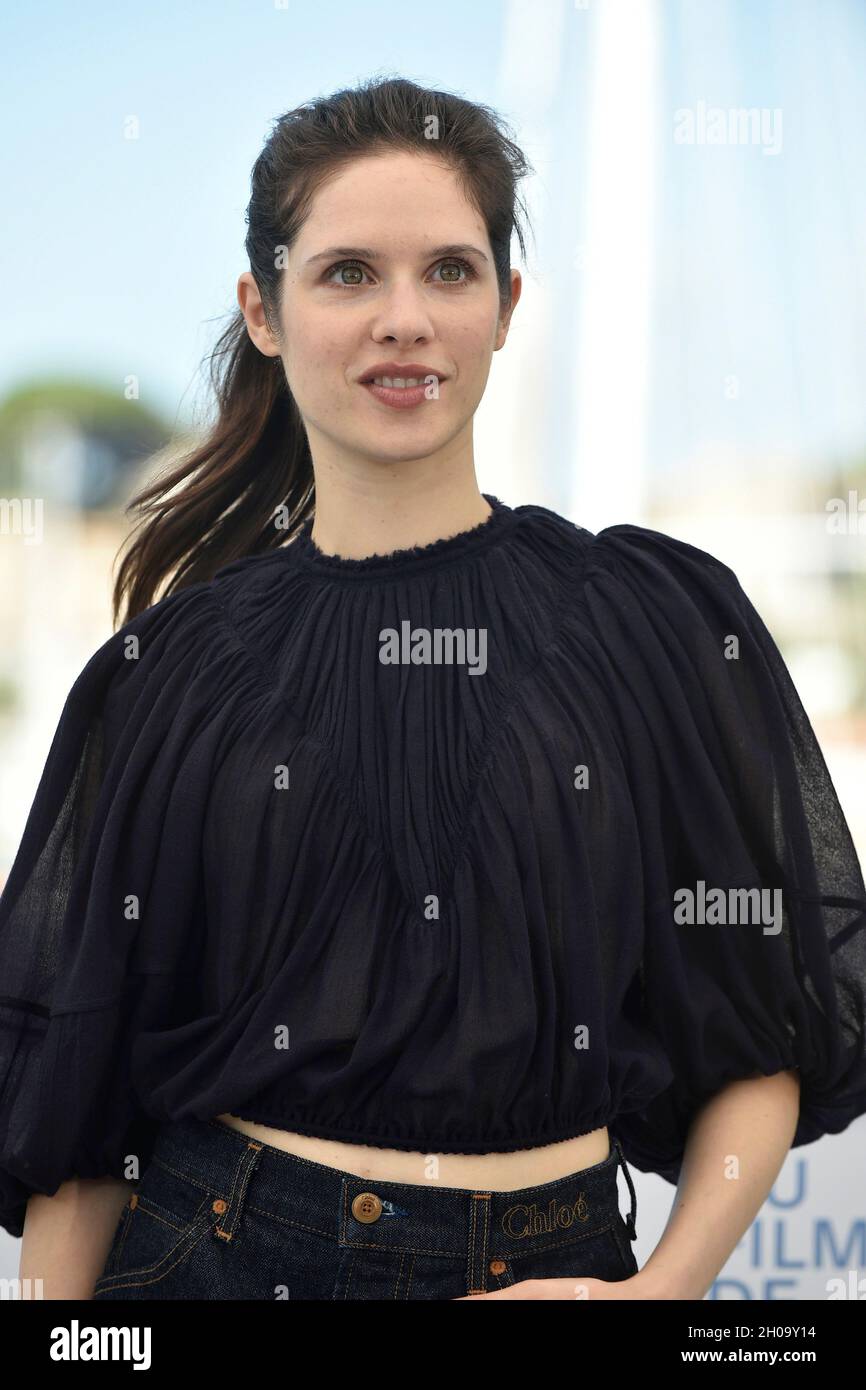 74th edition of the Cannes Film Festival: actress Daphne Patakia posing during a photocall for the film “Benedetta”, directed by Paul Verhoeven, on Ju Stock Photo