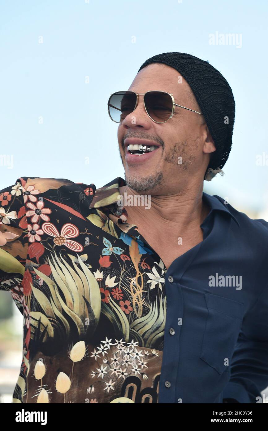 74th edition of the Cannes Film Festival: actor JoeyStarr posing during a photocall for the film “Cette musique ne joue pour personne”, directed by Sa Stock Photo