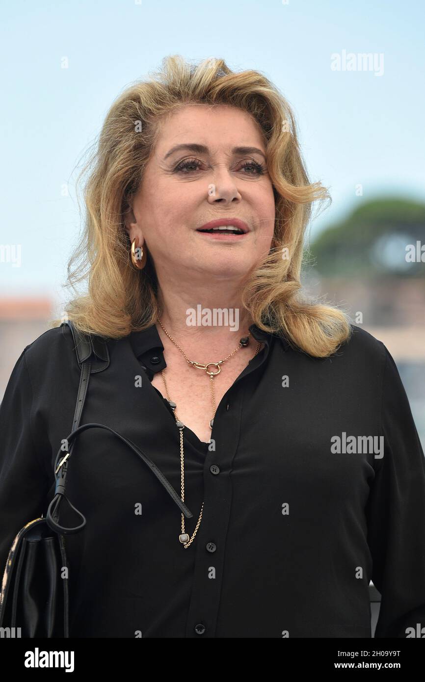 74th edition of the Cannes Film Festival: actress Catherine Deneuve posing during a photocall for the film “De son vivant”, directed by Emmanuelle Ber Stock Photo
