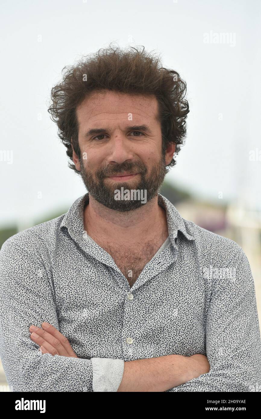 74th edition of the Cannes Film Festival: director Cyril Dion posing during a photocall for the film ÒAnimalÓ, on July 12, 2021 Stock Photo