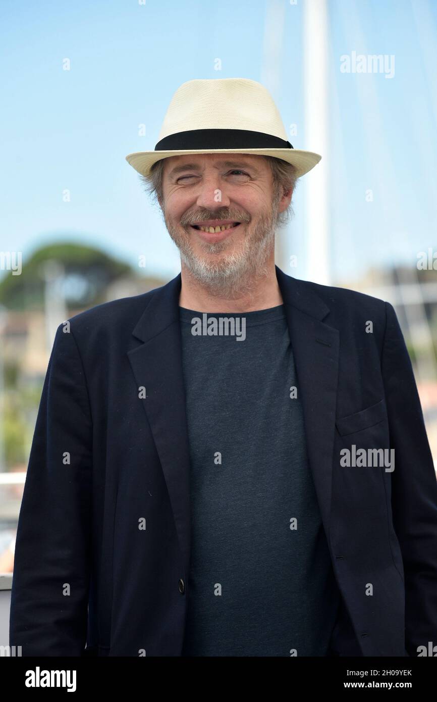 74th edition of the Cannes Film Festival: director Arnaud Desplechin posing during a photocall for the film “Deception” (French “Tromperie”), on July Stock Photo