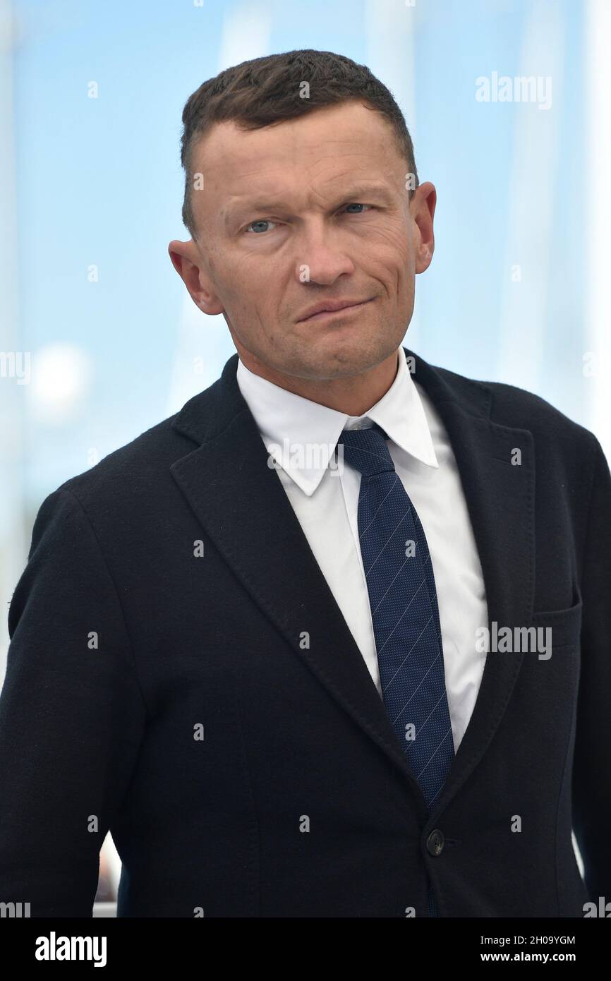74th edition of the Cannes Film Festival: writer Sylvain Tesson posing during a photocall for the film “The Velvet Queen” (French: “La panthere des ne Stock Photo