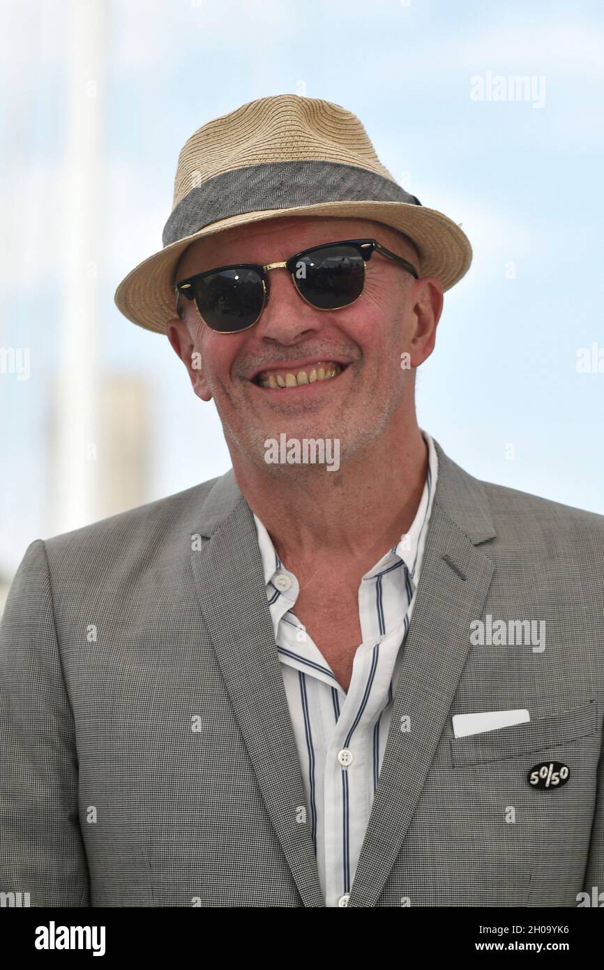 74th edition of the Cannes Film Festival: director Jacques Audiard posing during a photocall for the film “Paris, 13th District” (French: “Les Olympia Stock Photo