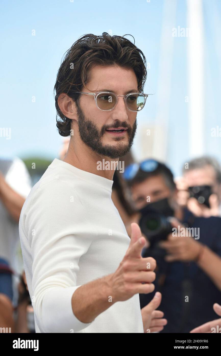 74th edition of the Cannes Film Festival: actor Pierre Niney posing during the photocall of the film 'OSS 117: From Africa with Love” (French: OSS 117 Stock Photo
