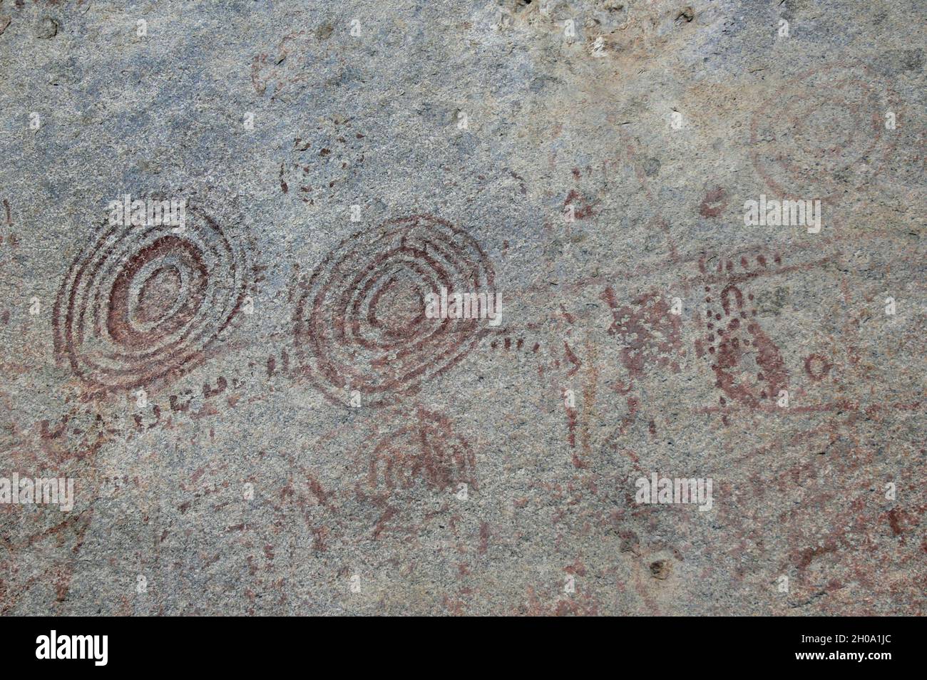 Rock paintings, believed to be dated from the Stone Age and over 1,000 years old, found in the town of Nyero about 300 km northeast of the capital city of Kampala. Uganda. 2006. Stock Photo