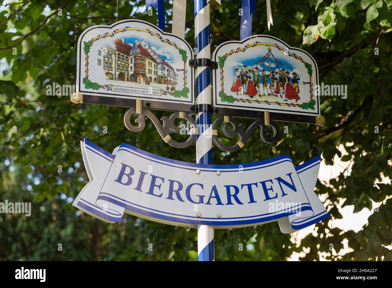 Burghausen, Germany - Jul 25, 2021: Sign 'Biergarten' - at the entrance of a traditional upper bavarian beergarden. Stock Photo