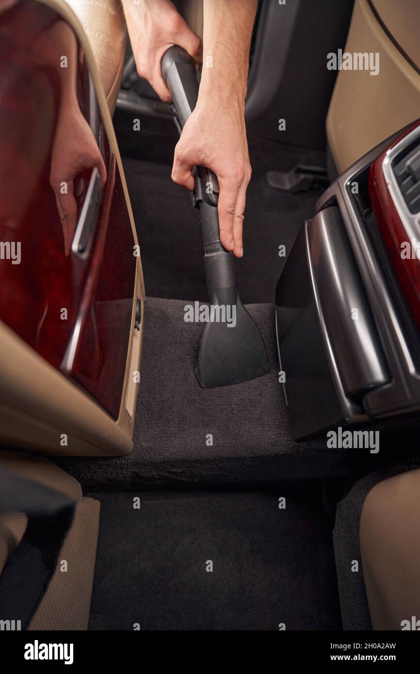 Photo of cleaning and vacuuming car interior during car detailing Stock Photo Alamy