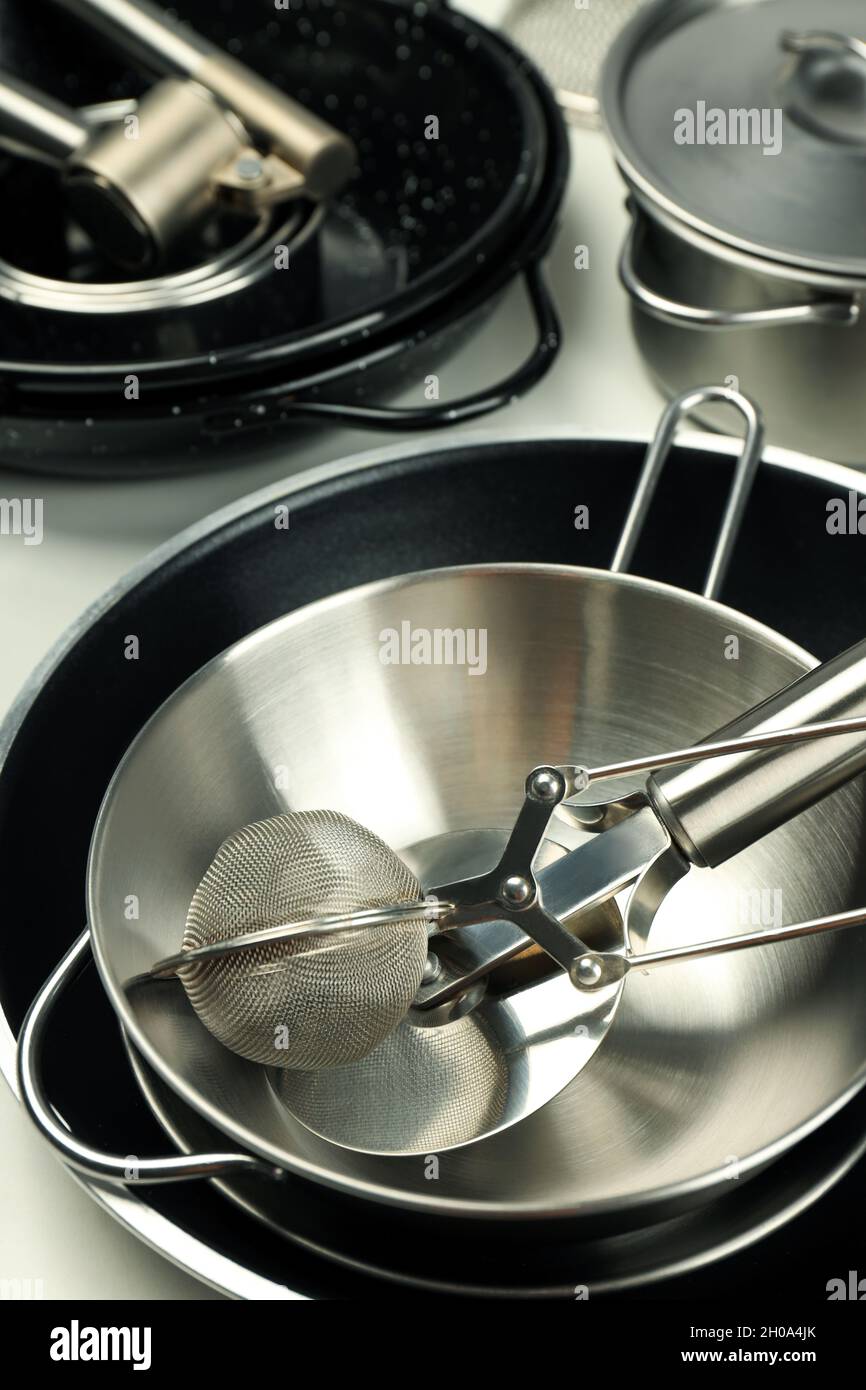 Set of different kitchen utensil on white background Stock Photo - Alamy