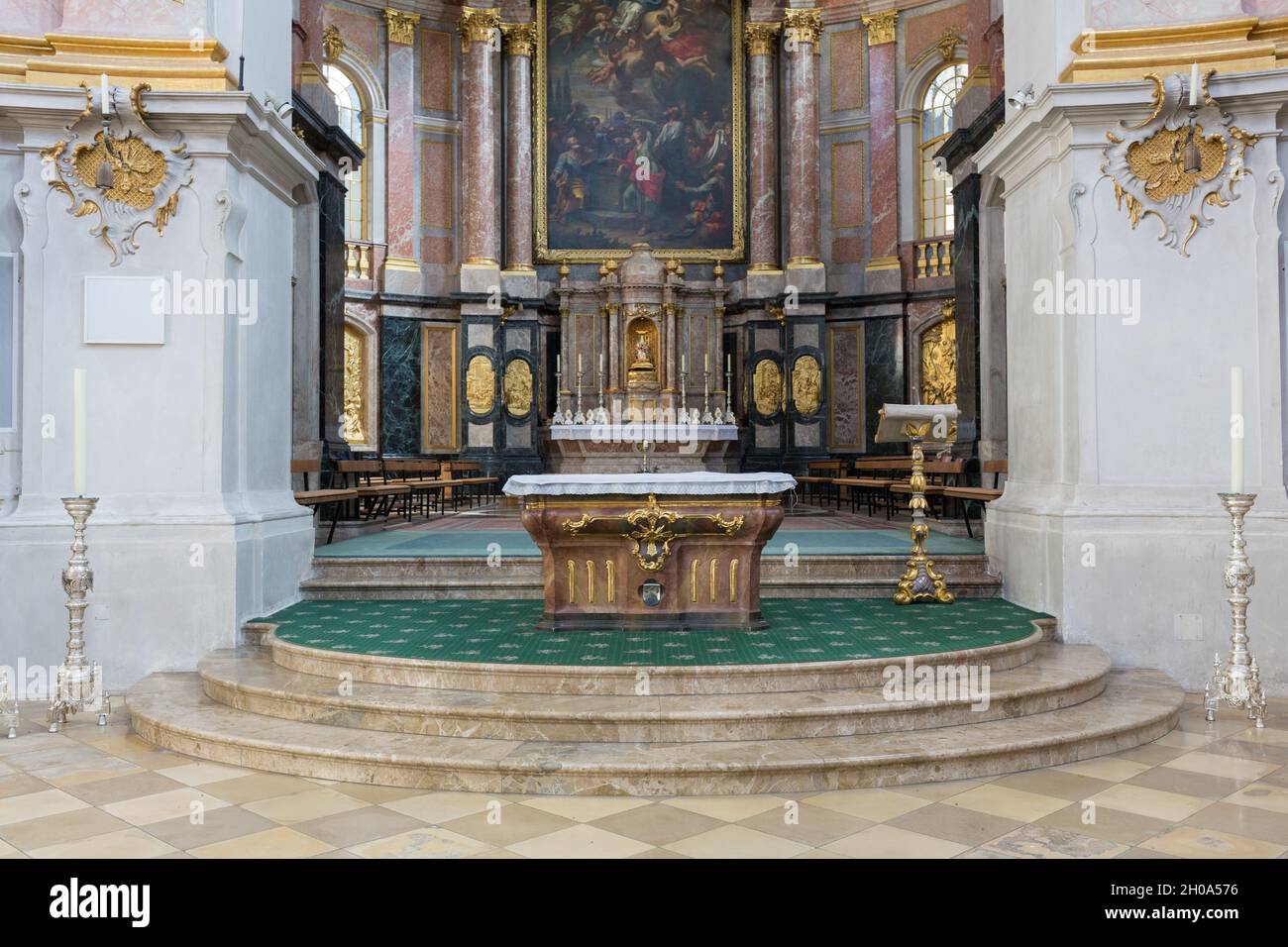Ettal, Germany - Feb 26, 2021: Altar inside the church of Ettal Abbey. Symbol for the christian religion and the holy mass. Stock Photo